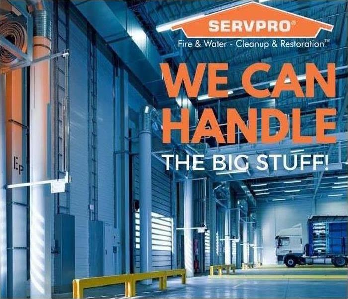 Large warehouse with wording that reads "We can handle the big stuff"